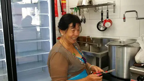 Great Aunty Three, smiling in the kitchen
